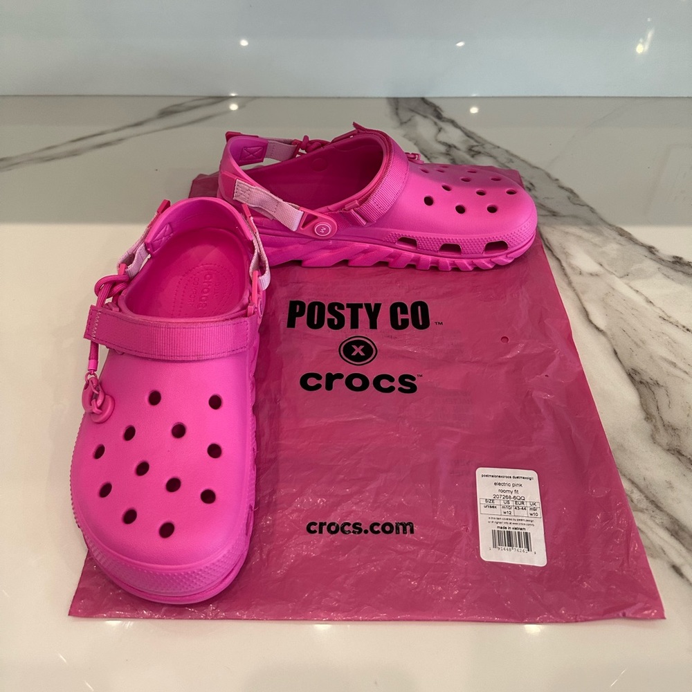 Men’s pink post Malone crocs men’s size 10, women’s 12